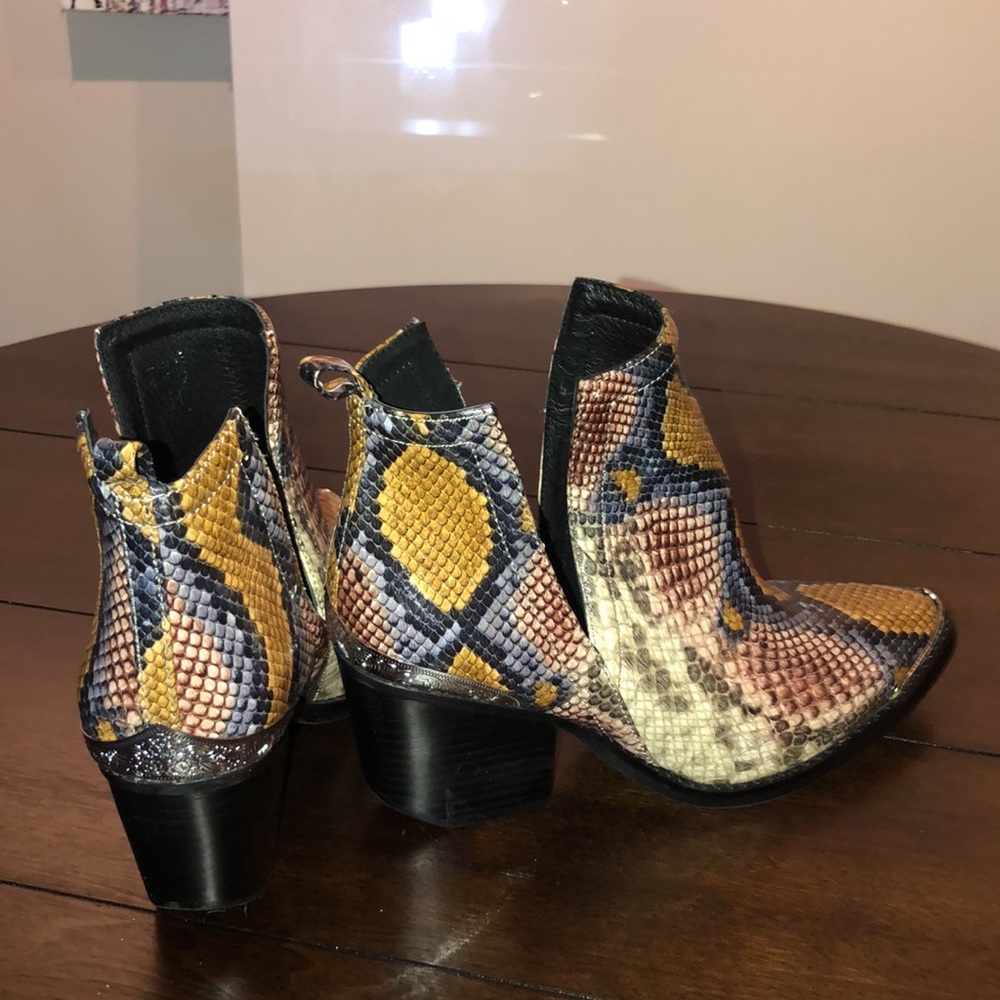 Snake skinned open side booties, never worn